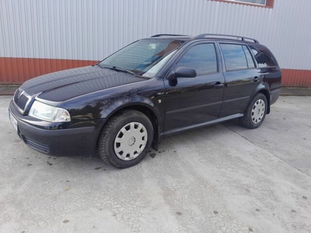 Чорний Шкода Октавія, об'ємом двигуна 2 л та пробігом 317 тис. км за 4200 $, фото 1 на Automoto.ua