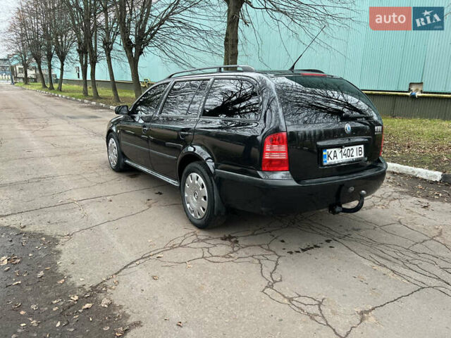 Черный Шкода Октавия, объемом двигателя 1.6 л и пробегом 263 тыс. км за 4500 $, фото 3 на Automoto.ua