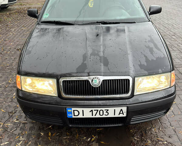 Черный Шкода Октавия, объемом двигателя 1.6 л и пробегом 215 тыс. км за 4800 $, фото 2 на Automoto.ua