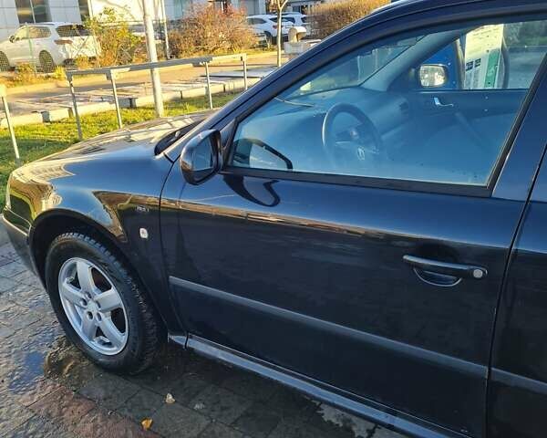 Черный Шкода Октавия, объемом двигателя 1.6 л и пробегом 221 тыс. км за 3200 $, фото 6 на Automoto.ua