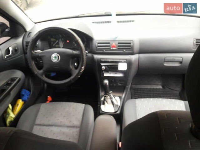 Черный Шкода Октавия, объемом двигателя 1.6 л и пробегом 204 тыс. км за 5200 $, фото 3 на Automoto.ua