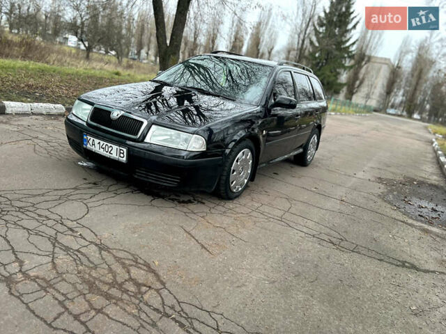 Черный Шкода Октавия, объемом двигателя 1.6 л и пробегом 263 тыс. км за 4500 $, фото 4 на Automoto.ua