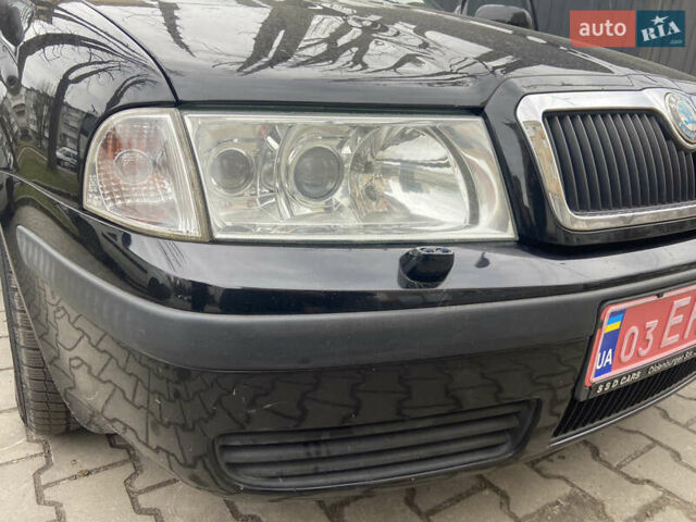 Черный Шкода Октавия, объемом двигателя 1.6 л и пробегом 210 тыс. км за 5600 $, фото 5 на Automoto.ua