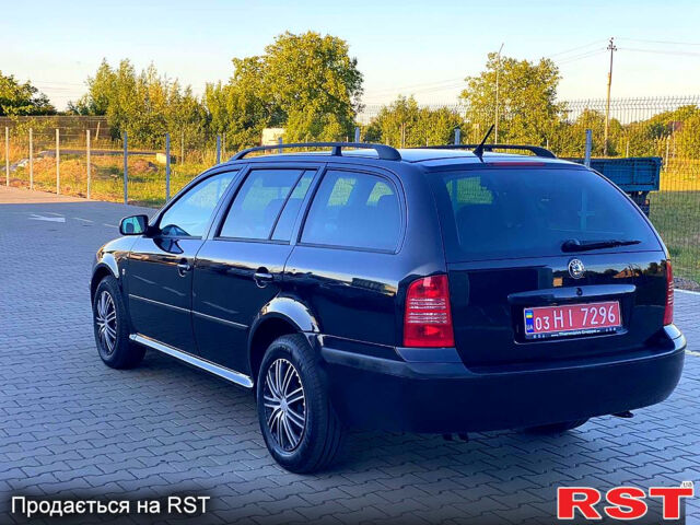 Черный Шкода Октавия, объемом двигателя 1.6 л и пробегом 245 тыс. км за 4950 $, фото 4 на Automoto.ua