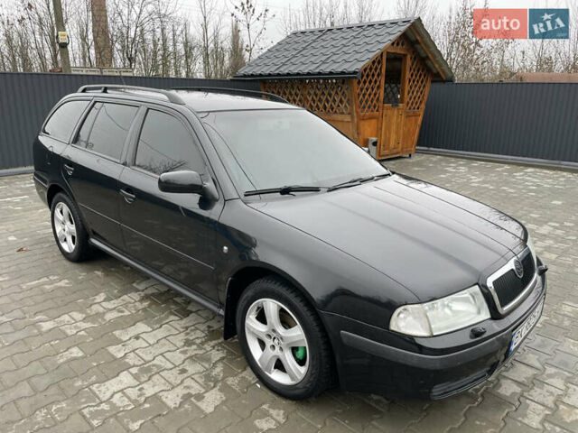 Черный Шкода Октавия, объемом двигателя 1.6 л и пробегом 348 тыс. км за 4200 $, фото 4 на Automoto.ua