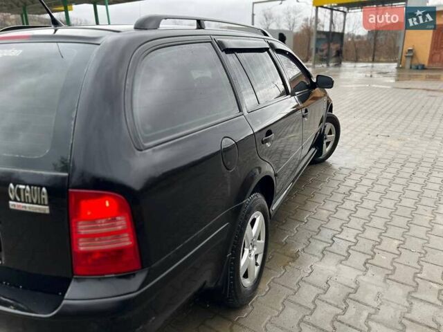 Черный Шкода Октавия, объемом двигателя 1.8 л и пробегом 309 тыс. км за 4299 $, фото 4 на Automoto.ua