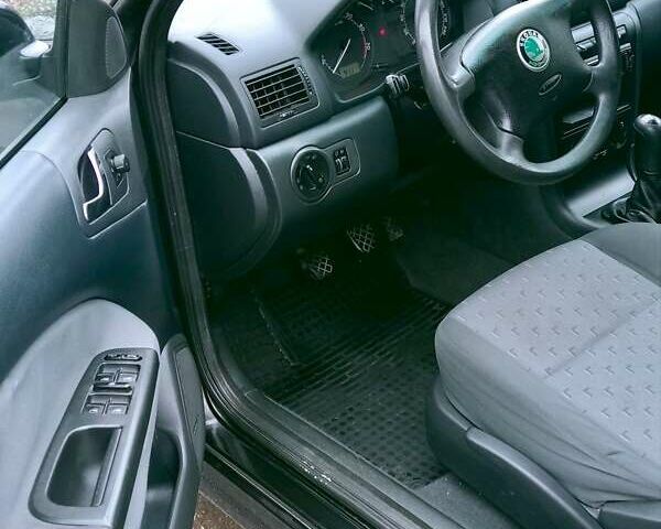 Черный Шкода Октавия, объемом двигателя 1.6 л и пробегом 220 тыс. км за 4600 $, фото 8 на Automoto.ua