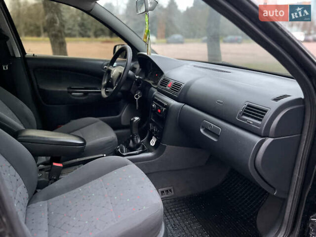 Черный Шкода Октавия, объемом двигателя 1.6 л и пробегом 263 тыс. км за 4500 $, фото 8 на Automoto.ua