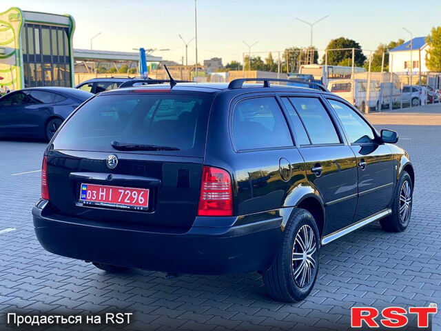 Черный Шкода Октавия, объемом двигателя 1.6 л и пробегом 245 тыс. км за 4950 $, фото 3 на Automoto.ua