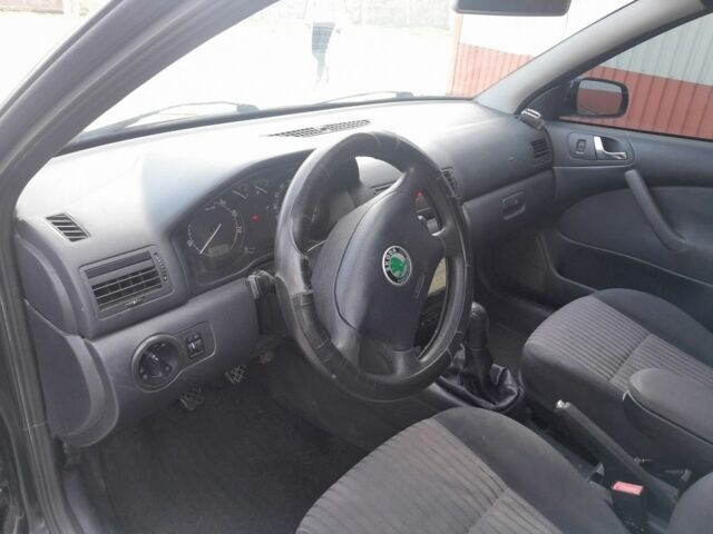 Чорний Шкода Октавія, об'ємом двигуна 2 л та пробігом 317 тис. км за 4200 $, фото 8 на Automoto.ua