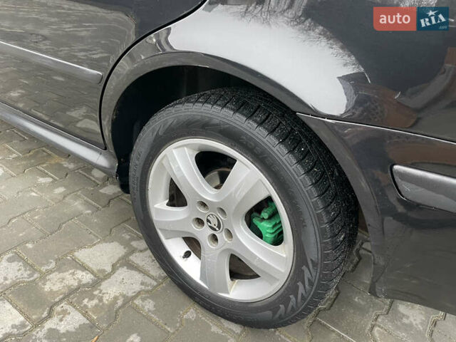 Черный Шкода Октавия, объемом двигателя 1.6 л и пробегом 348 тыс. км за 4200 $, фото 16 на Automoto.ua