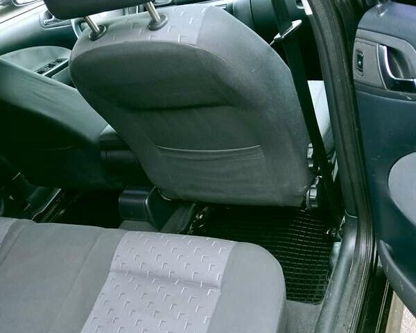 Черный Шкода Октавия, объемом двигателя 1.6 л и пробегом 220 тыс. км за 4600 $, фото 11 на Automoto.ua