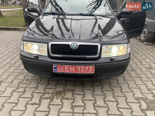 Черный Шкода Октавия, объемом двигателя 1.6 л и пробегом 210 тыс. км за 5600 $, фото 3 на Automoto.ua