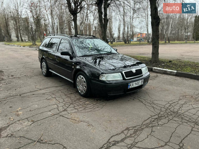 Черный Шкода Октавия, объемом двигателя 1.6 л и пробегом 263 тыс. км за 4500 $, фото 2 на Automoto.ua