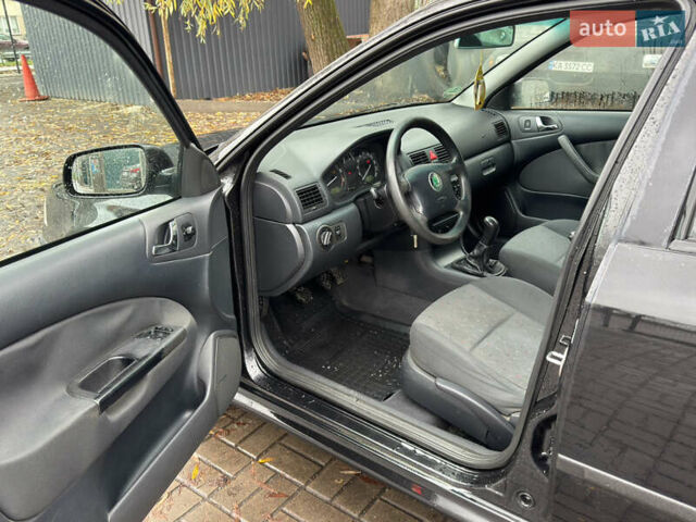 Черный Шкода Октавия, объемом двигателя 1.6 л и пробегом 215 тыс. км за 4800 $, фото 11 на Automoto.ua