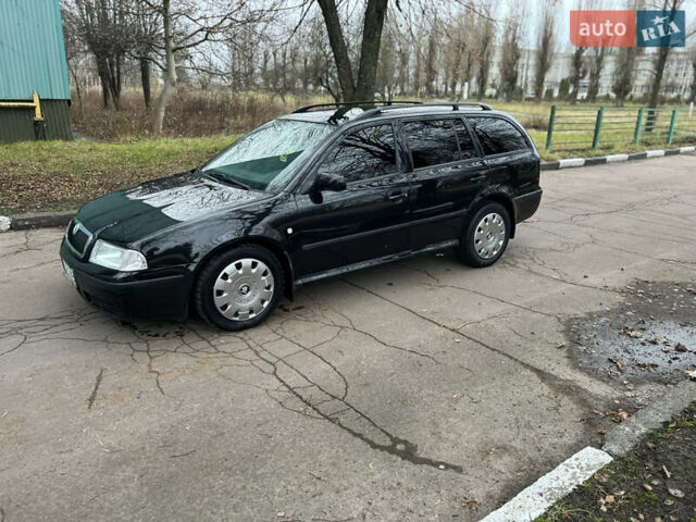 Черный Шкода Октавия, объемом двигателя 1.6 л и пробегом 263 тыс. км за 4500 $, фото 9 на Automoto.ua