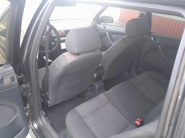 Чорний Шкода Октавія, об'ємом двигуна 2 л та пробігом 317 тис. км за 4200 $, фото 6 на Automoto.ua