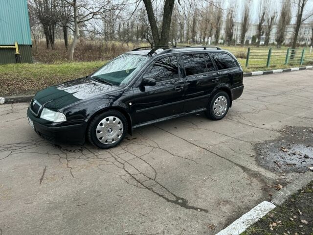 Черный Шкода Октавия, объемом двигателя 1.6 л и пробегом 279 тыс. км за 4500 $, фото 8 на Automoto.ua