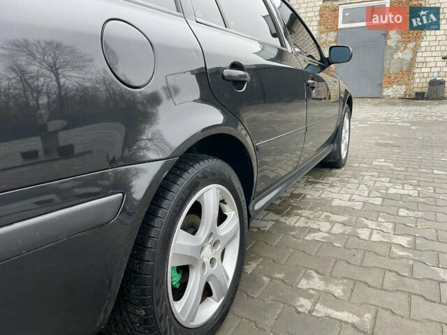 Черный Шкода Октавия, объемом двигателя 1.6 л и пробегом 348 тыс. км за 4200 $, фото 11 на Automoto.ua