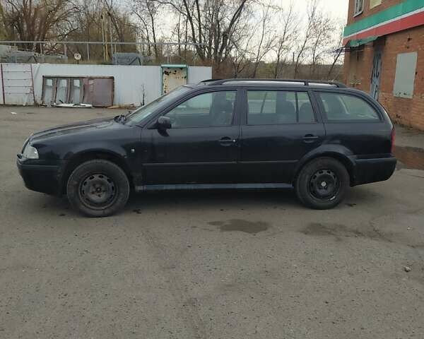 Черный Шкода Октавия, объемом двигателя 1.6 л и пробегом 270 тыс. км за 4500 $, фото 7 на Automoto.ua