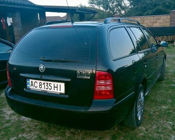 Черный Шкода Октавия, объемом двигателя 1.6 л и пробегом 220 тыс. км за 4600 $, фото 4 на Automoto.ua