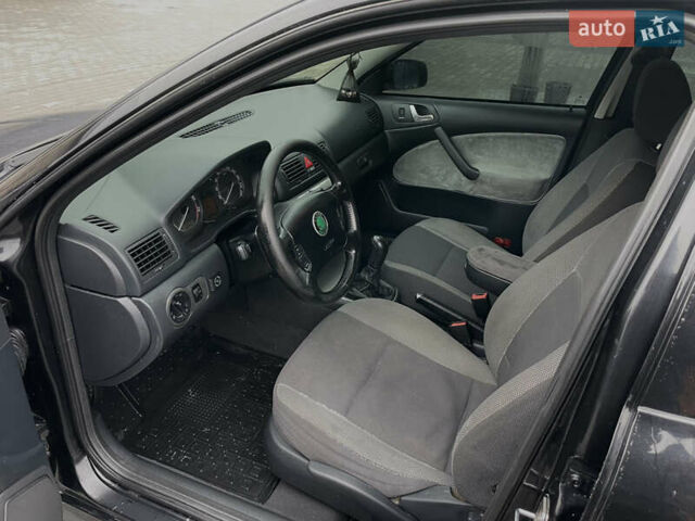 Черный Шкода Октавия, объемом двигателя 1.6 л и пробегом 348 тыс. км за 4200 $, фото 20 на Automoto.ua