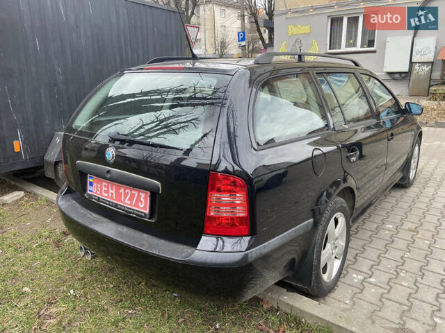 Черный Шкода Октавия, объемом двигателя 1.6 л и пробегом 210 тыс. км за 5600 $, фото 4 на Automoto.ua