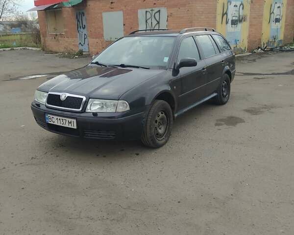 Черный Шкода Октавия, объемом двигателя 1.6 л и пробегом 270 тыс. км за 4500 $, фото 10 на Automoto.ua