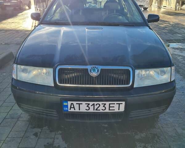 Черный Шкода Октавия, объемом двигателя 1.6 л и пробегом 221 тыс. км за 3200 $, фото 2 на Automoto.ua