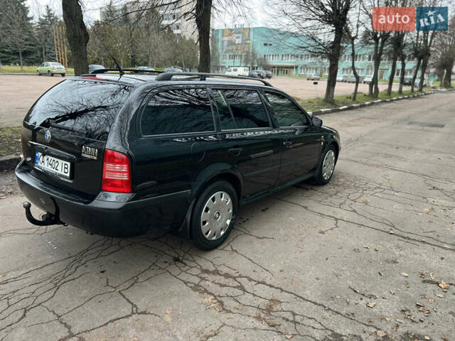 Черный Шкода Октавия, объемом двигателя 1.6 л и пробегом 263 тыс. км за 4500 $, фото 11 на Automoto.ua