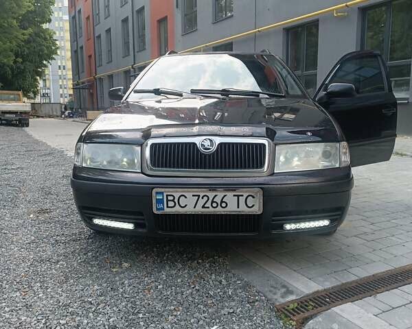 Черный Шкода Октавия, объемом двигателя 1.8 л и пробегом 300 тыс. км за 3700 $, фото 2 на Automoto.ua