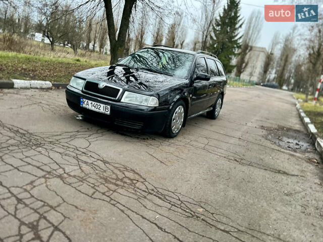 Черный Шкода Октавия, объемом двигателя 1.6 л и пробегом 263 тыс. км за 4500 $, фото 5 на Automoto.ua