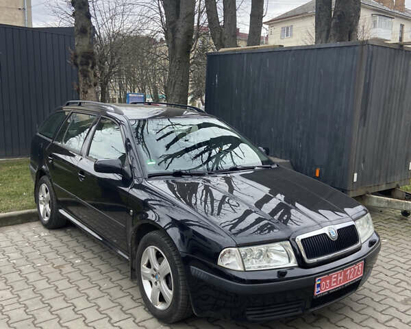 Черный Шкода Октавия, объемом двигателя 1.6 л и пробегом 210 тыс. км за 5600 $, фото 2 на Automoto.ua