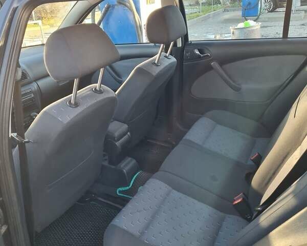 Черный Шкода Октавия, объемом двигателя 1.6 л и пробегом 221 тыс. км за 3200 $, фото 11 на Automoto.ua