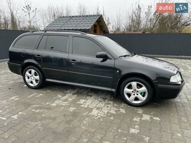 Черный Шкода Октавия, объемом двигателя 1.6 л и пробегом 348 тыс. км за 4200 $, фото 7 на Automoto.ua