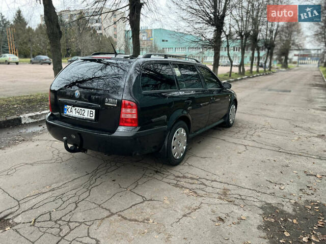 Черный Шкода Октавия, объемом двигателя 1.6 л и пробегом 263 тыс. км за 4500 $, фото 12 на Automoto.ua