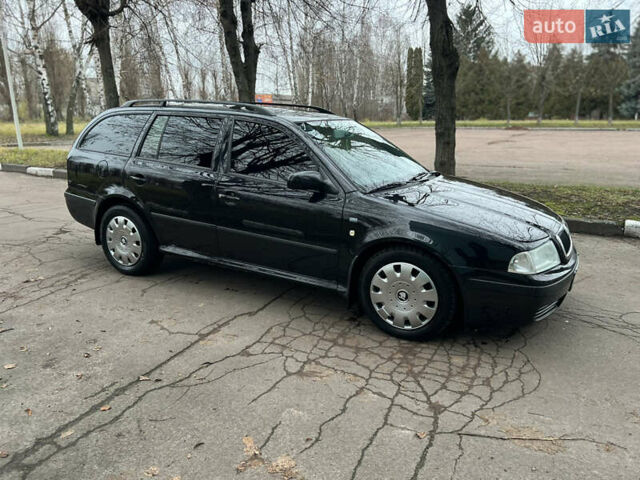 Черный Шкода Октавия, объемом двигателя 1.6 л и пробегом 263 тыс. км за 4500 $, фото 13 на Automoto.ua