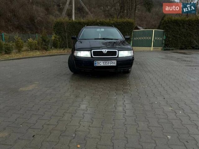 Черный Шкода Октавия, объемом двигателя 1.8 л и пробегом 309 тыс. км за 4299 $, фото 1 на Automoto.ua