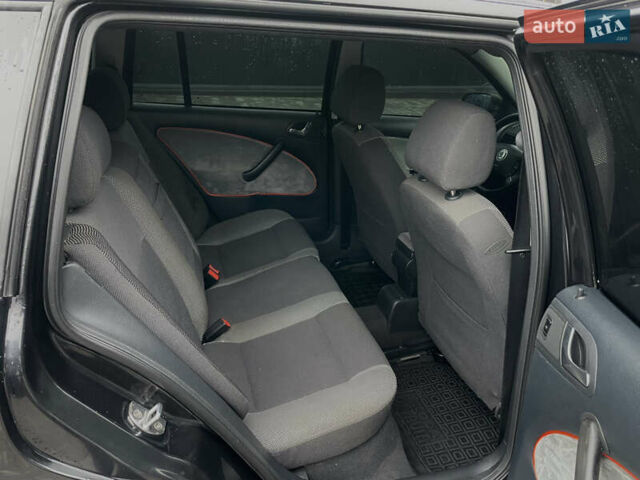 Черный Шкода Октавия, объемом двигателя 1.6 л и пробегом 348 тыс. км за 4200 $, фото 22 на Automoto.ua