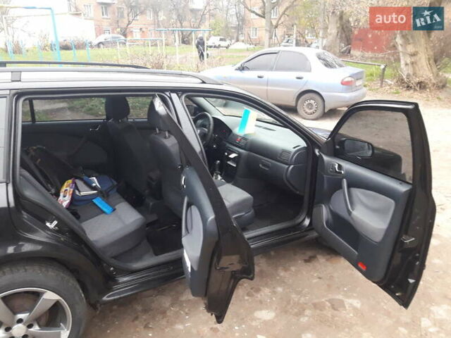 Черный Шкода Октавия, объемом двигателя 1.6 л и пробегом 204 тыс. км за 5200 $, фото 2 на Automoto.ua