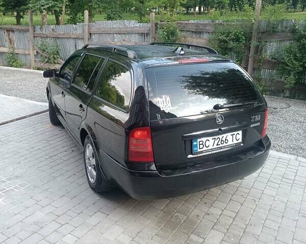 Черный Шкода Октавия, объемом двигателя 1.8 л и пробегом 300 тыс. км за 3700 $, фото 1 на Automoto.ua