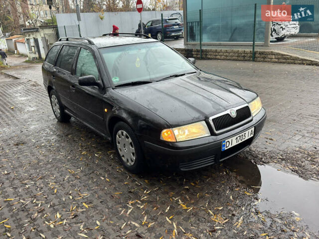 Черный Шкода Октавия, объемом двигателя 1.6 л и пробегом 215 тыс. км за 4800 $, фото 3 на Automoto.ua