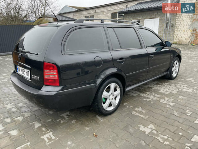 Черный Шкода Октавия, объемом двигателя 1.6 л и пробегом 348 тыс. км за 4200 $, фото 8 на Automoto.ua