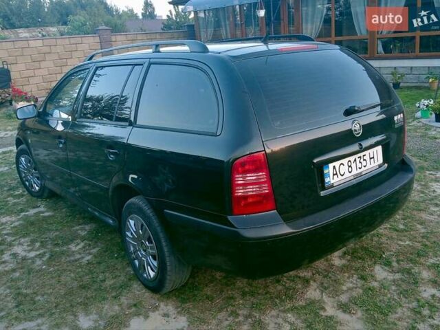 Черный Шкода Октавия, объемом двигателя 1.6 л и пробегом 220 тыс. км за 4600 $, фото 5 на Automoto.ua