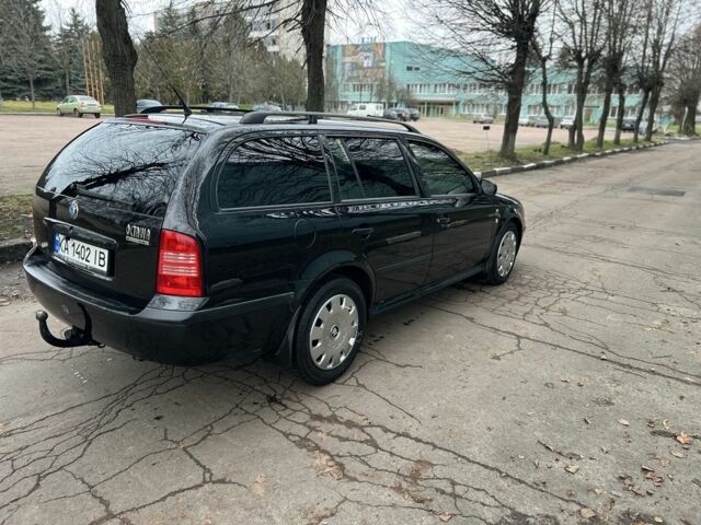 Черный Шкода Октавия, объемом двигателя 1.6 л и пробегом 279 тыс. км за 4500 $, фото 7 на Automoto.ua