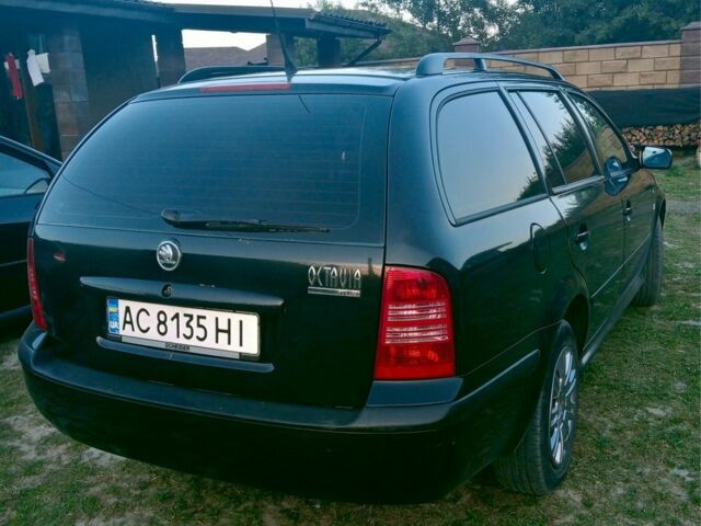 Черный Шкода Октавия, объемом двигателя 1.6 л и пробегом 220 тыс. км за 4874 $, фото 2 на Automoto.ua