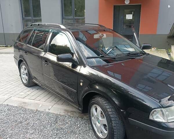 Черный Шкода Октавия, объемом двигателя 1.8 л и пробегом 300 тыс. км за 3700 $, фото 3 на Automoto.ua