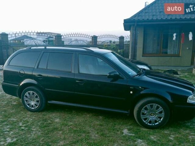 Черный Шкода Октавия, объемом двигателя 1.6 л и пробегом 220 тыс. км за 4600 $, фото 15 на Automoto.ua