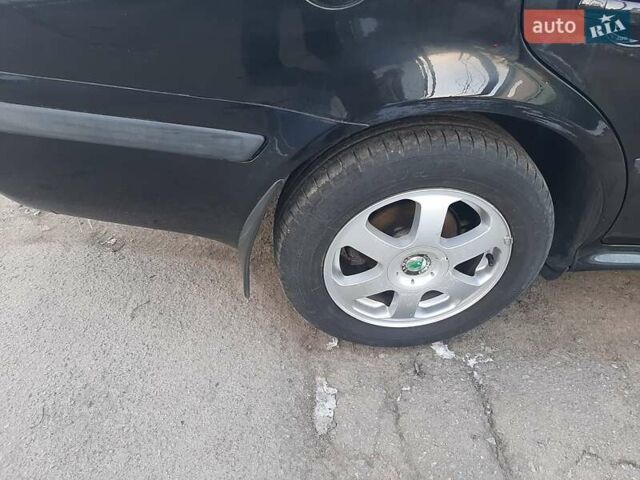 Черный Шкода Октавия, объемом двигателя 1.78 л и пробегом 223 тыс. км за 5500 $, фото 95 на Automoto.ua