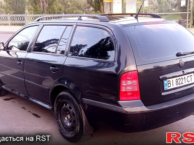 Черный Шкода Октавия, объемом двигателя 1.6 л и пробегом 200 тыс. км за 6000 $, фото 1 на Automoto.ua